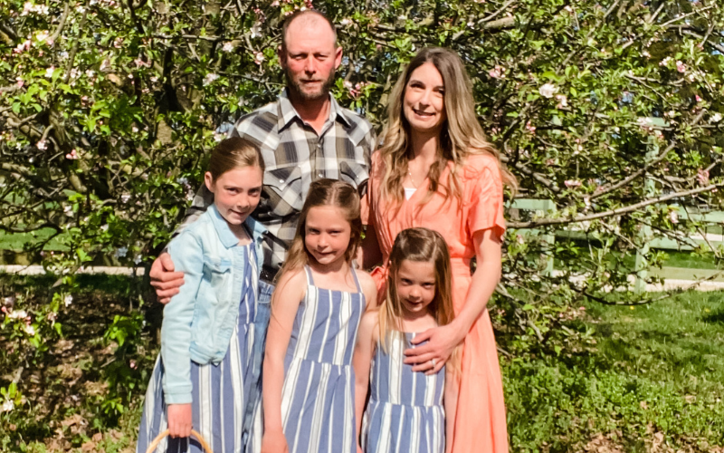 the Haglund family from the ranchers homestead by trees