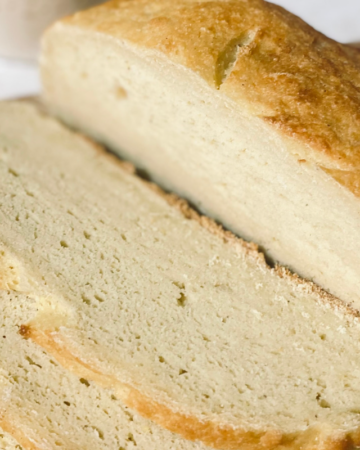 sliced gluten free sourdough bread on a cutting board